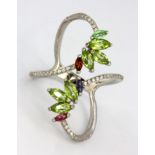 A 925 silver ring set with marquise cut peridots and other semi-precious stones, (T).