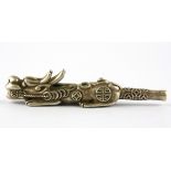 A Chinese silvered bronze dragon cheroot holder, L. 11cm.