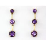 A pair of 9ct yellow gold (stamped 10k) amethyst set drop earrings, L. 2.5cm.