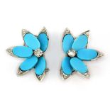 A pair of white metal (tested 18ct gold) clip earrings set with turquoise and diamonds, L. 3cm.