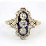 An Art Deco yellow and white metal (tested 18ct gold and platinum with foreign hallmarks) ring set