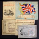 Seven cigarette card albums.