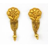 A pair of yellow metal (tested 22ct gold) stud earrings, L. 3.2cm.