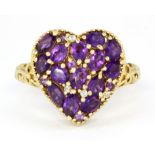 A 925 silver gilt amethyst and white stone set heart shaped ring, (S.5).