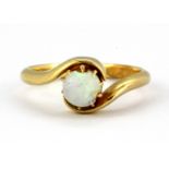 A yellow metal (tested 18ct gold) opal set ring, (opal a/f), (K).