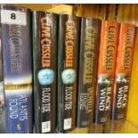 Six books by Clive Cussler including some duplicates and three first editions.