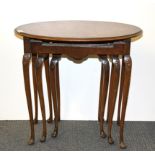 A nest of three walnut coffee tables, size 59 x 42 x 54cm.