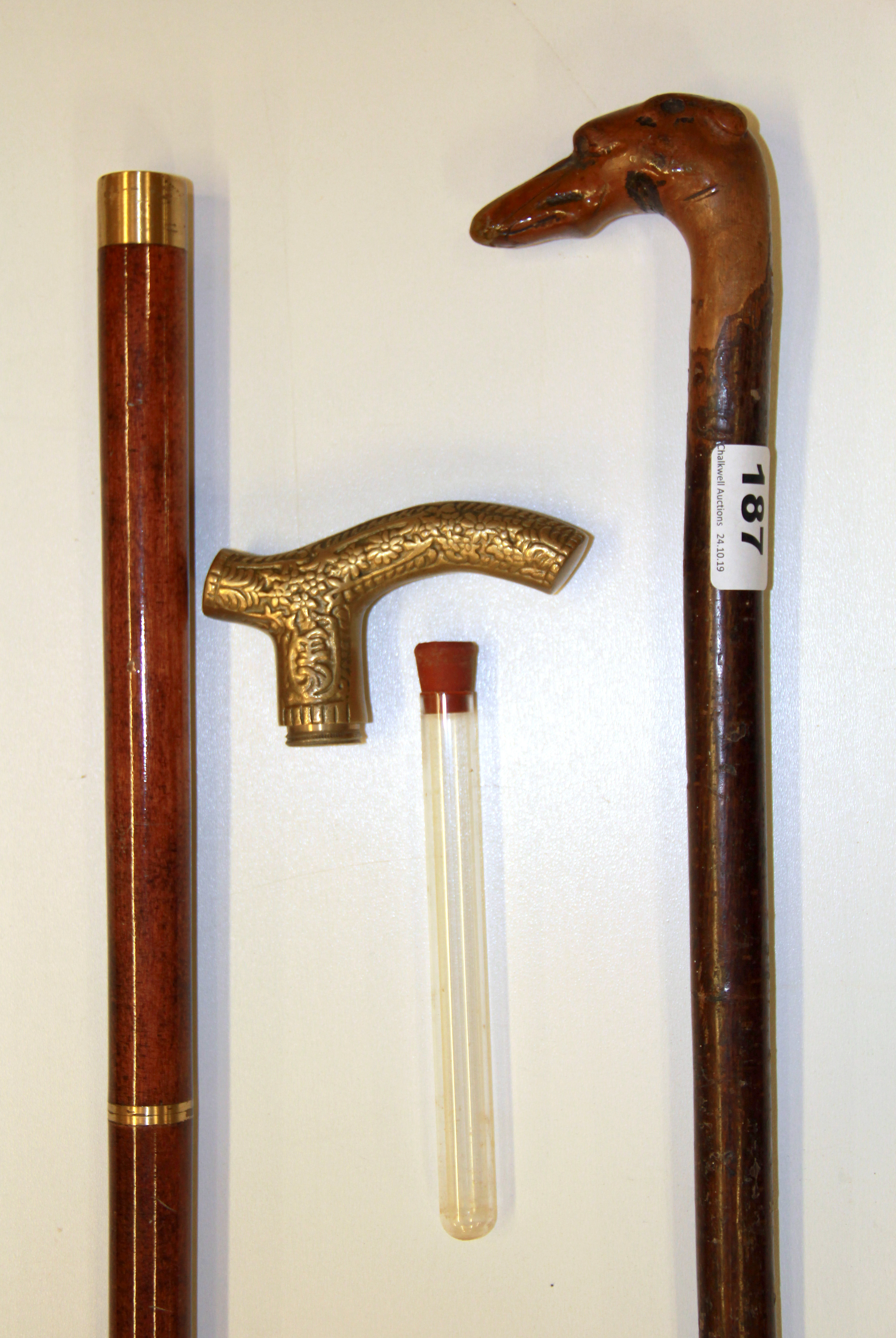 An interesting carved greyhound head walking stick and a modern brass handled walking stick - Image 3 of 3