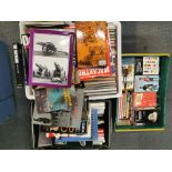 A large quantity of military and warfare related books. Boxes not included.