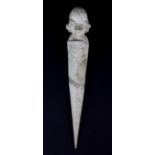 A Chinese archaic form carved jade ritual dagger, L. 22cm.