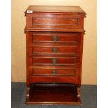 A 1920's mahogany music cabinet, size 47 x 38 x 79cm.