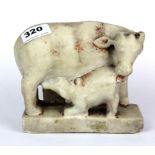 An 18th century Indian carved marble figure of a sacred cow and calf, size 17 x 14 x 7cm.
