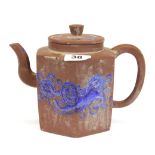 A Chinese Yixing terracotta teapot with enamelled decoration, H. 16cm.