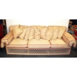 An excellent quality three seater conservatory settee with loose cushions, L. 198cm.