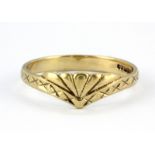 A 9ct yellow gold patterned ring, (M).
