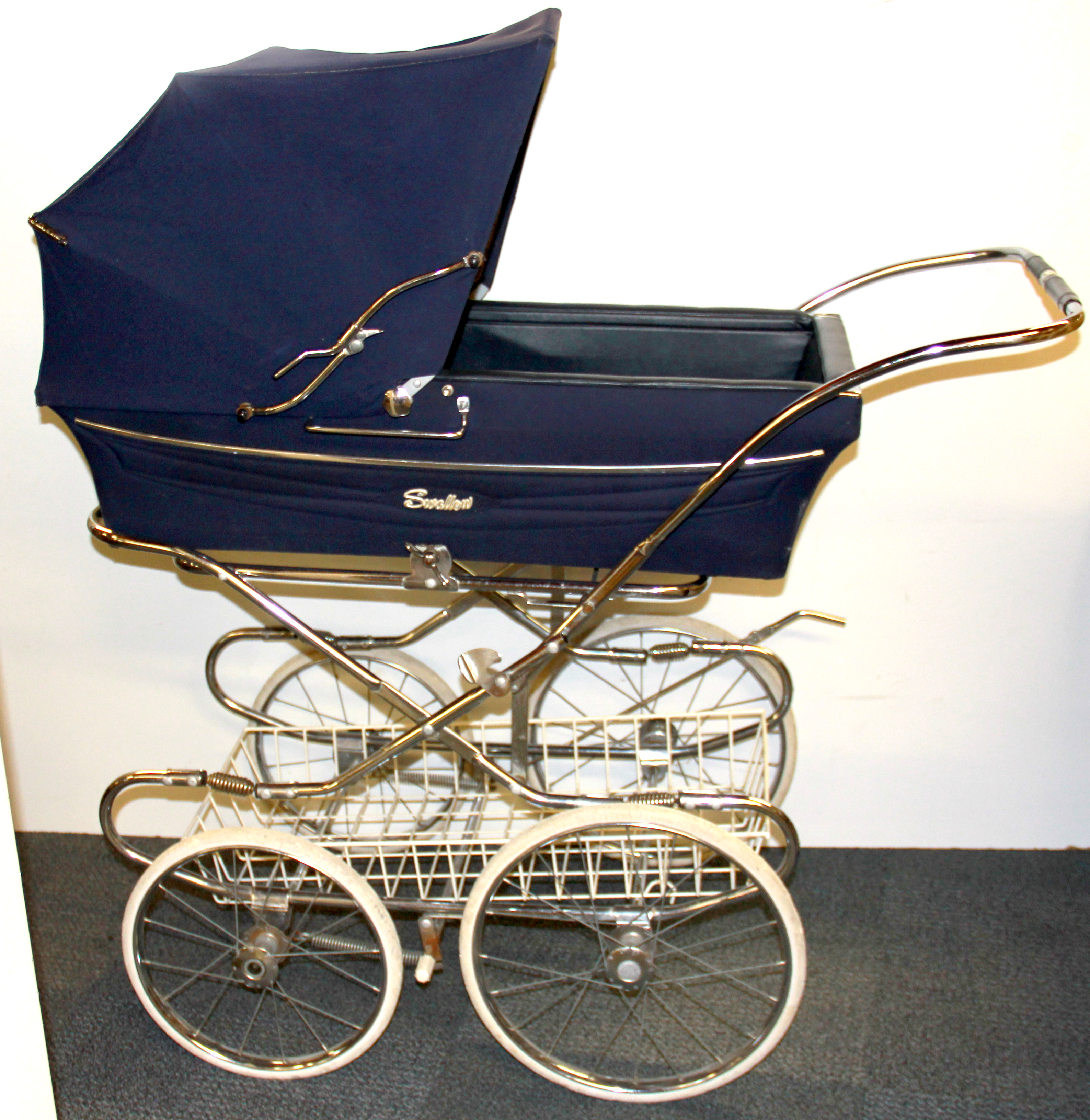 A vintage Swallow baby's pram.