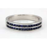 A 925 silver ring set with two rows of round cut natural untreated sapphires, (M).