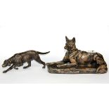 A bronzed metal figure of a dog and a cold cast figure, largest L. 26cm.