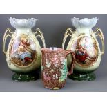 A Majolica leaf jug and a pair of Victorian vases, vase H. 37cm.