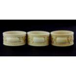 Three 19th century Chinese carved ivory napkin rings, Dia. 5cm.