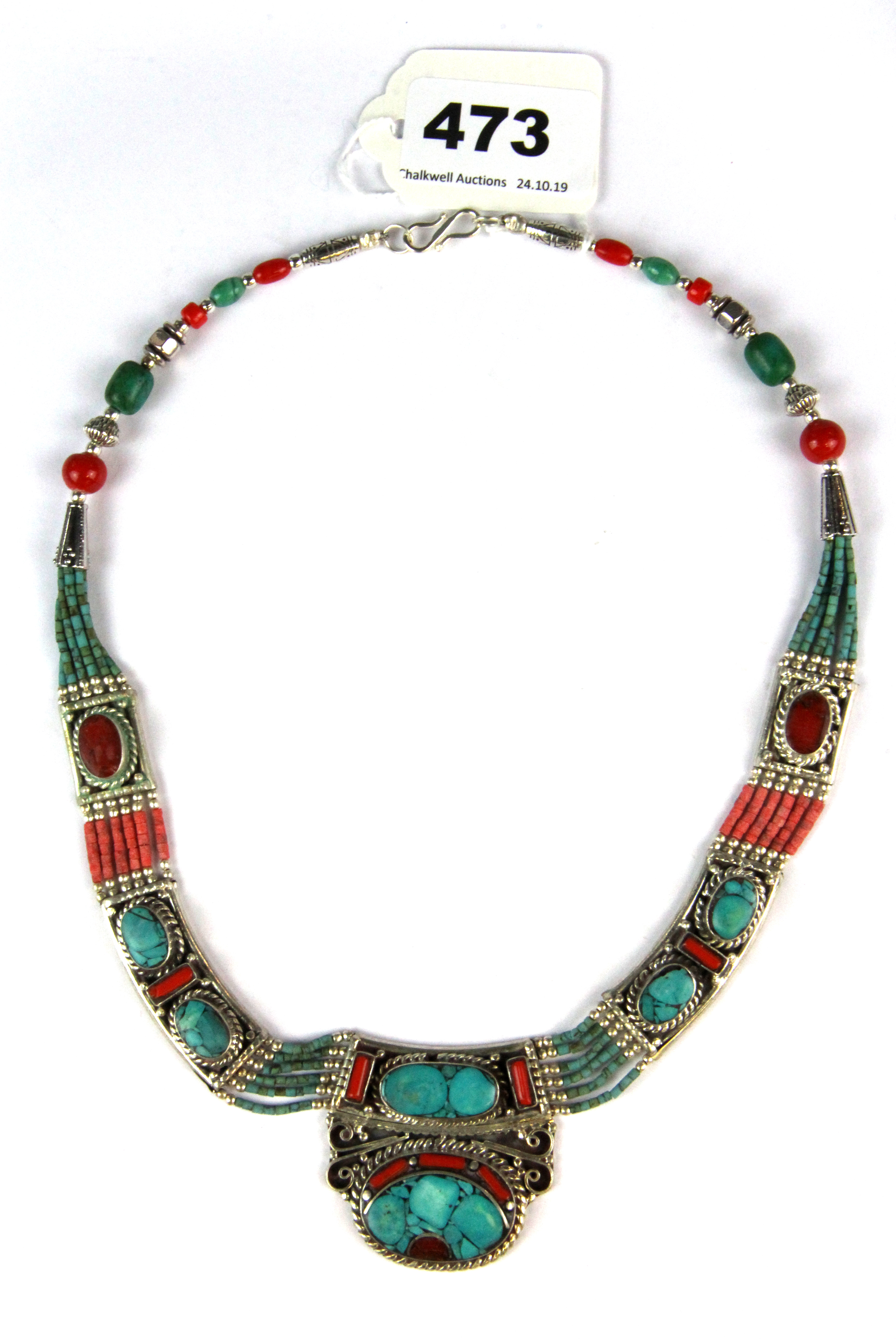 A Tibetan white metal tribal necklace.
