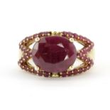 A 925 silver gilt ruby set ring, (M).