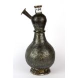Islamic interest. An 18th Century Eastern silvered and engraved copper hookah pipe base, H. 34cm.