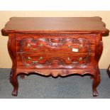 A small two drawer carved mahogany chest, size 87 x 37 x 60cm.