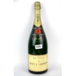 A 150cl vintage bottle of Moet & Chandon champagne.