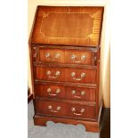 A small mahogany veneered bureau, size 51 x 43 x 95cm.