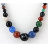 An unusual graduated mixed colour agate necklace, L. 44cm.