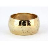 A 9ct yellow gold wedding band, (K).