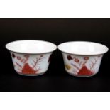 A pair of fine Chinese hand painted porcelain tea bowls, Dia. 8cm D. 4cm.