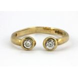 A 9ct yellow gold stone set adjustable ring.