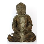 A Chinese carved and gesso finished wooden temple Buddha, H. 43cm.