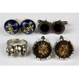 A 925 silver skull ring with a pair of silver Bvlgari cuff links and two further pairs of