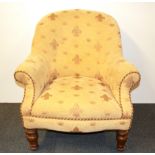 An attractive upholstered armchair.