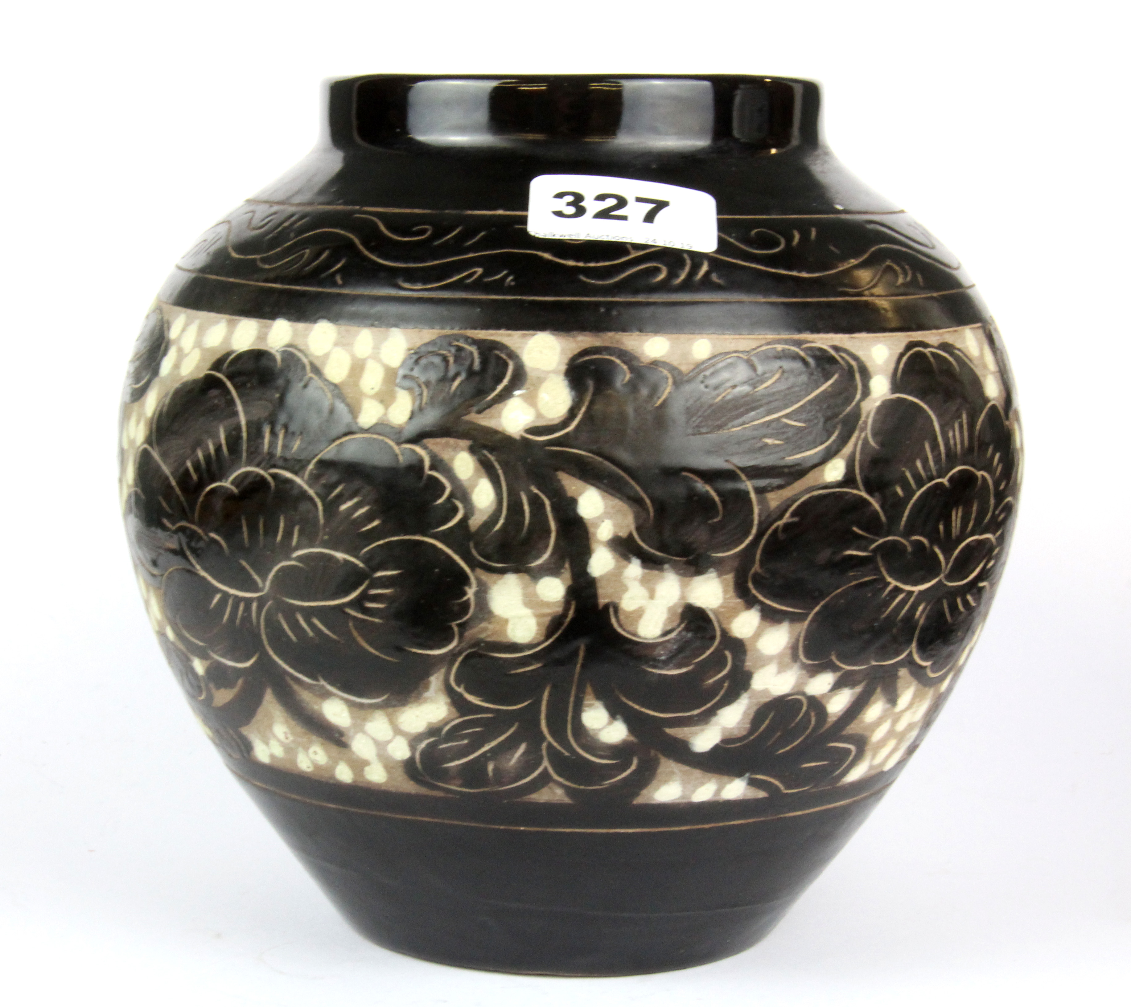 A Chinese incised brown glazed Yuan dynasty style vase, H. 19cm.