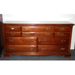 A reproduction mahogany ten drawer chest, W. 173cm H. 87cm.
