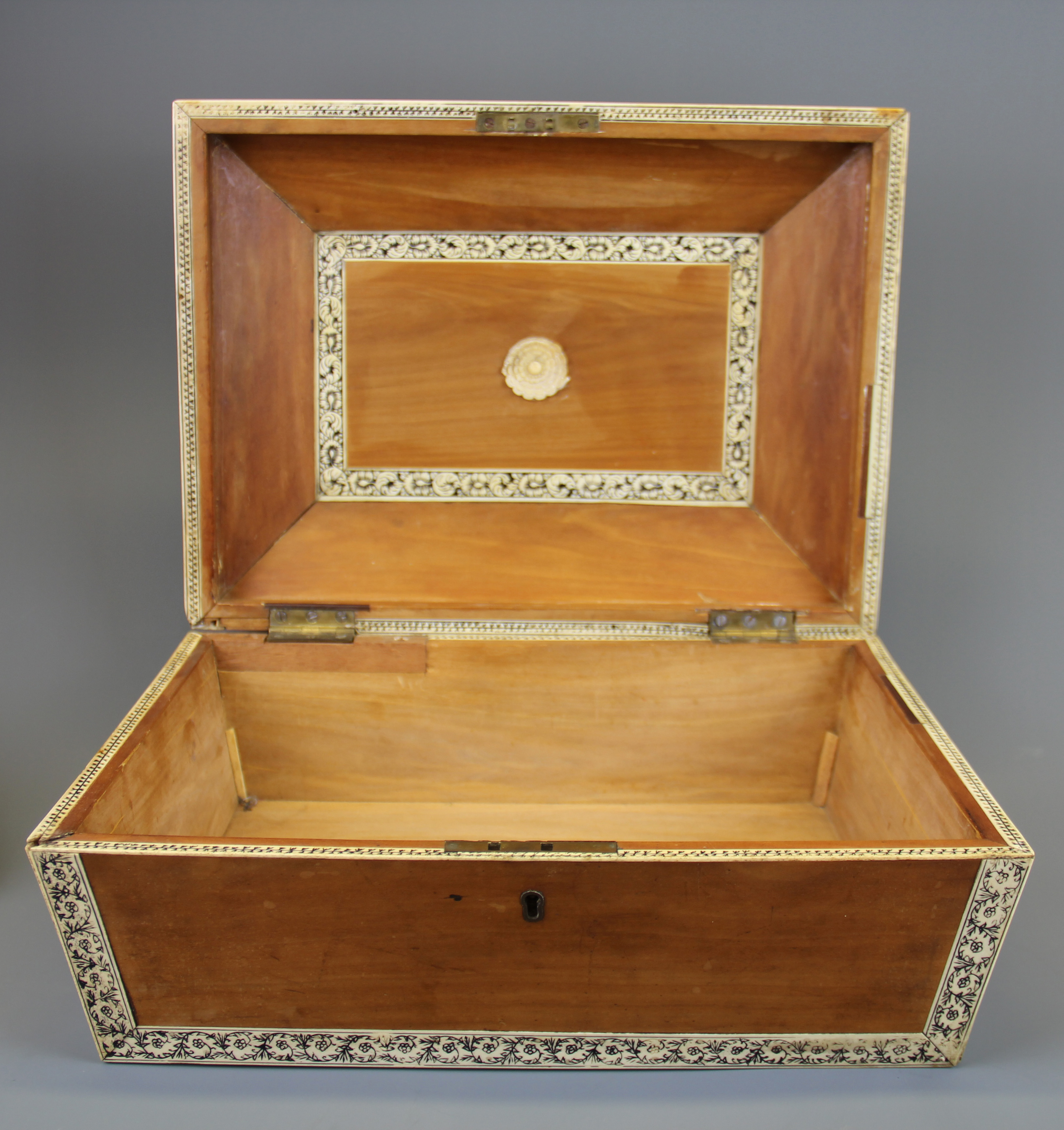 An early 19th century carved sandalwood and ivory decorated casket, size 36 x 27 x 23cm. - Image 2 of 2