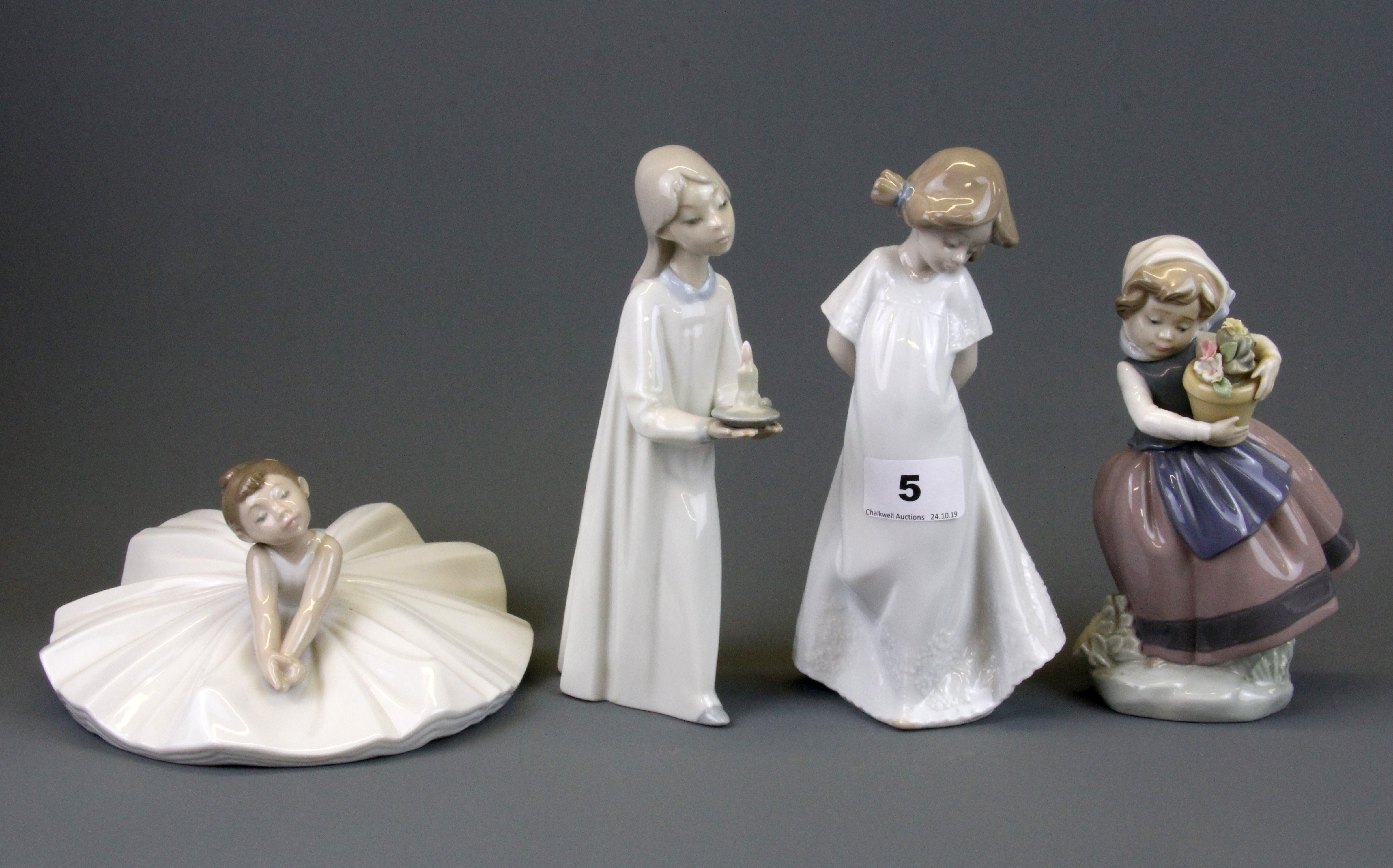 Two Lladro figurines and two Nao figurines, Lladro girl with flower pot and Nao girl with flared