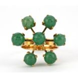 A 14ct yellow gold jade set ring, dia 2.4cm.