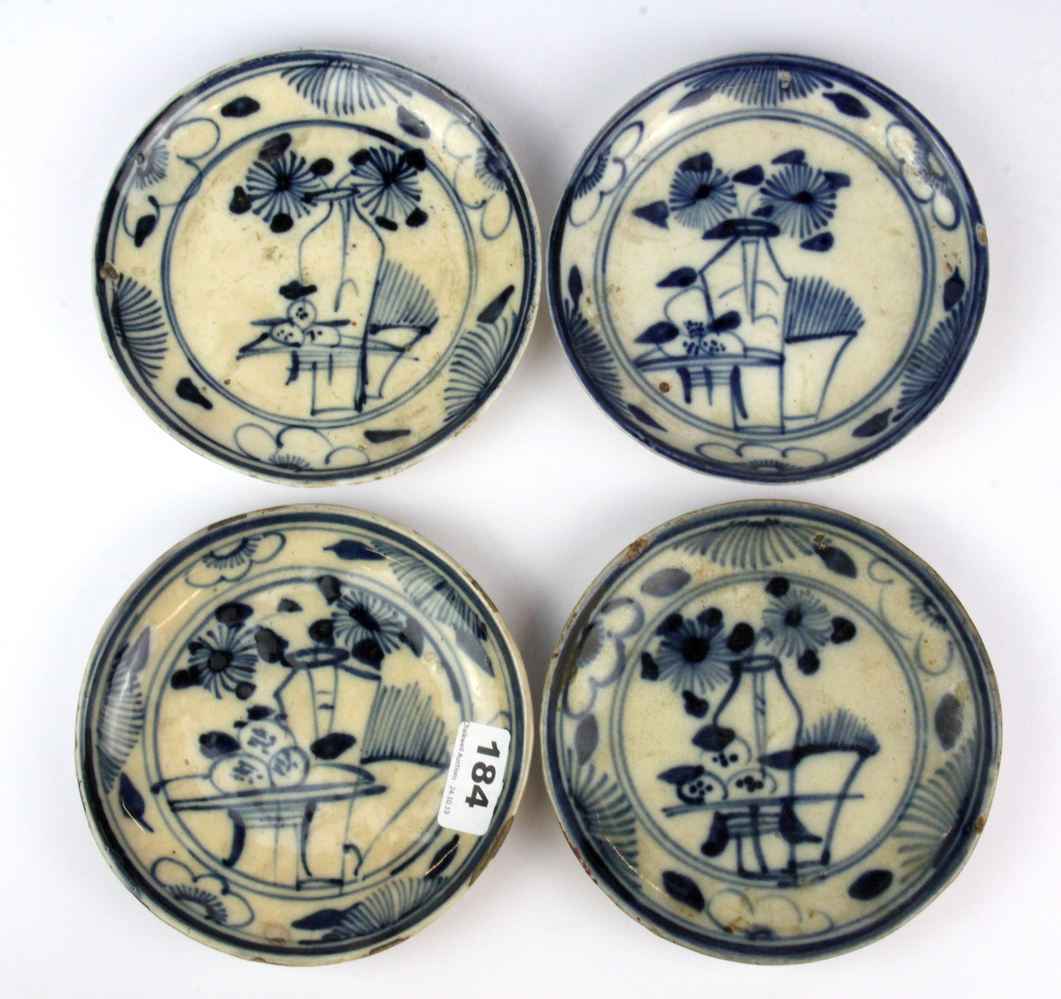 A set of four 18th Century hand painted provincial porcelain plates, Dia. 16cm.