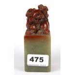 A mid 20th century Chinese carved soapstone seal, H. 12cm.