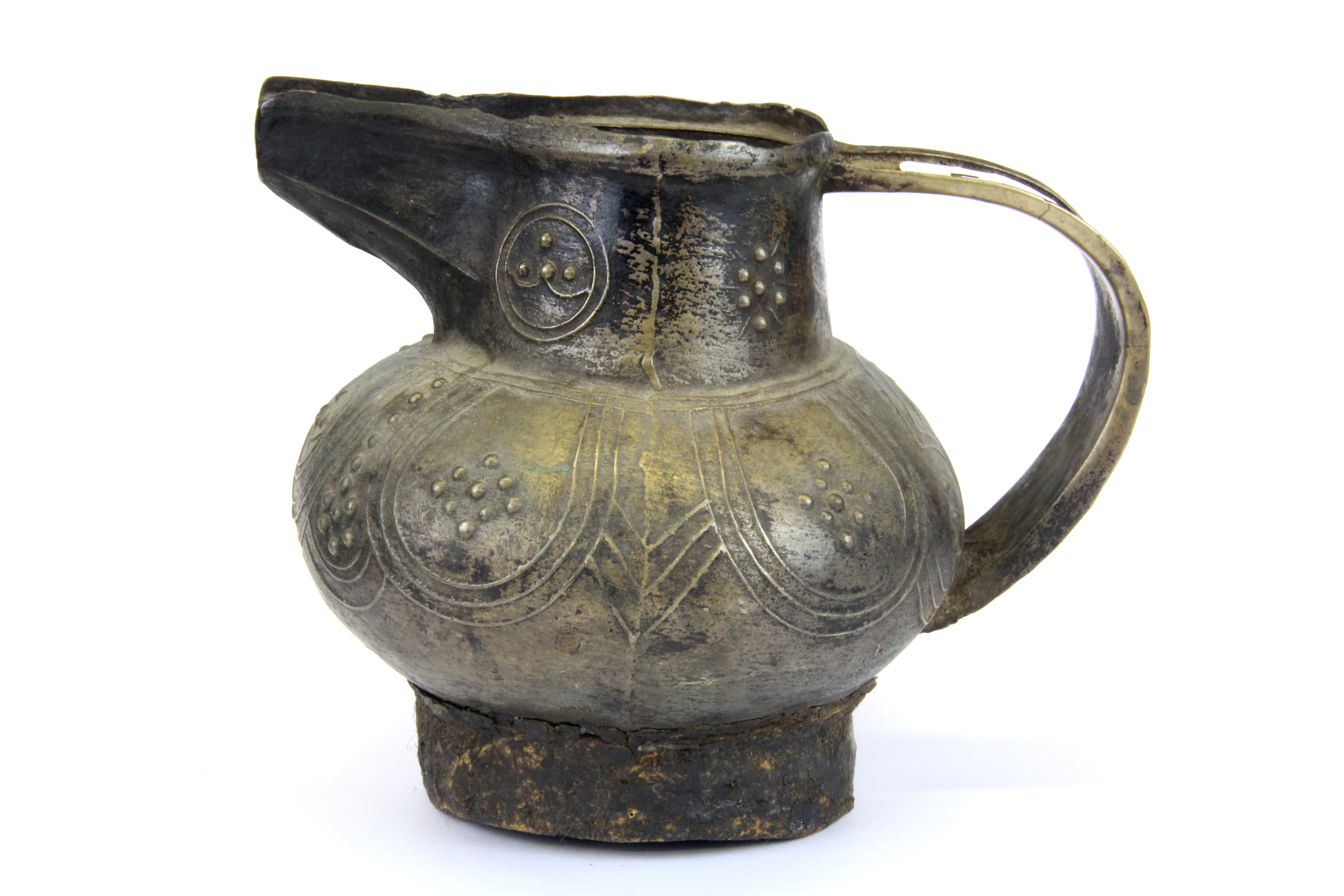 A 19th Century Tibetan cast bronze jug probably used for yak butter candle filling, A/F to foot,