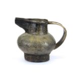 A 19th Century Tibetan cast bronze jug probably used for yak butter candle filling, A/F to foot,