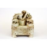An interesting mid 20thC Chinese carved soapstone scholars set of desk seals, size 14 x 13 x 13cm.