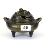 A 19th/ early 20th Century Chinese cast bronze censer, W. 15cm H. 11cm.