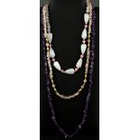 Three necklaces of amethyst, rose quartz and white agate beads.
