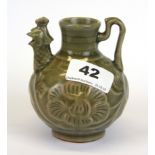 An interesting Chinese celadon glazed pottery water dropper with double spout, H. 10cm.